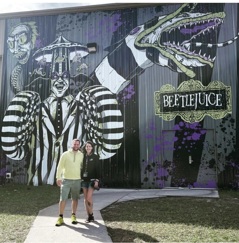 Sean and his wife at a Halloween Horror Nights Beetlejuice house in Orlando